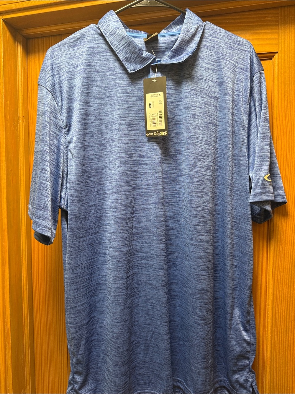 Oakley Men’s Heathered Light Blue Polo